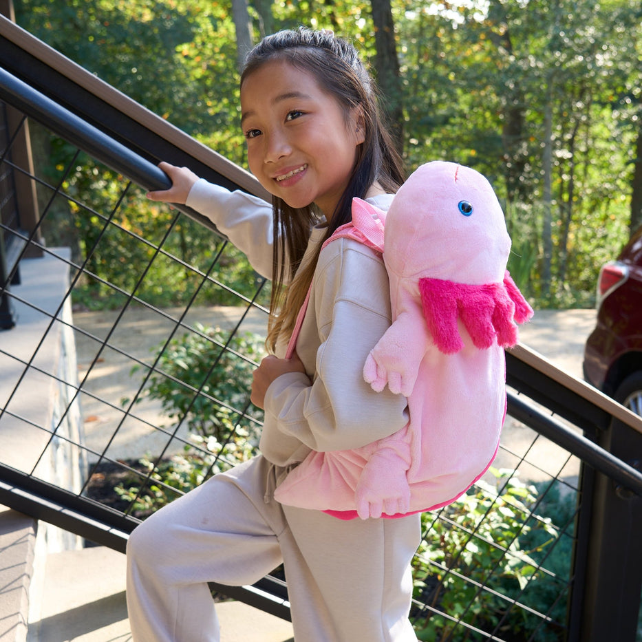 Girl wearing Axolotl Backpack