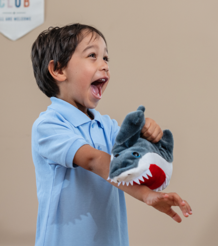 Kid with Shark Slapstick Toy